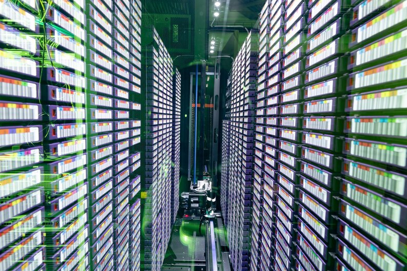 [freepicdownloader.com]-data-center-with-multiple-rows-fully-operational-server-racks-modern-cloud-computing-technology-concept-medium